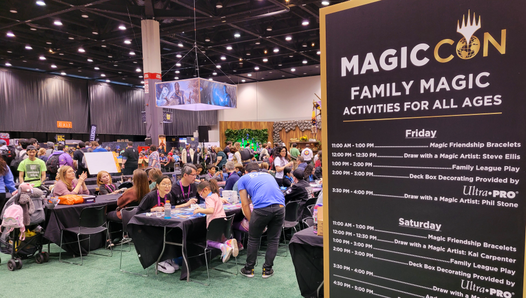 Photo of the MagicCon Family Magic sign with a full lineup of free events and activities throughout the weekend.